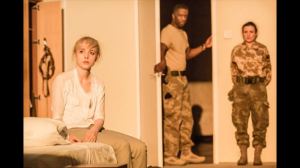 Olivia Vinall as Desdemona, Adrian Lester as Othello, and Lyndsey Marshal as Emilia. Photo by Johan Persson. 